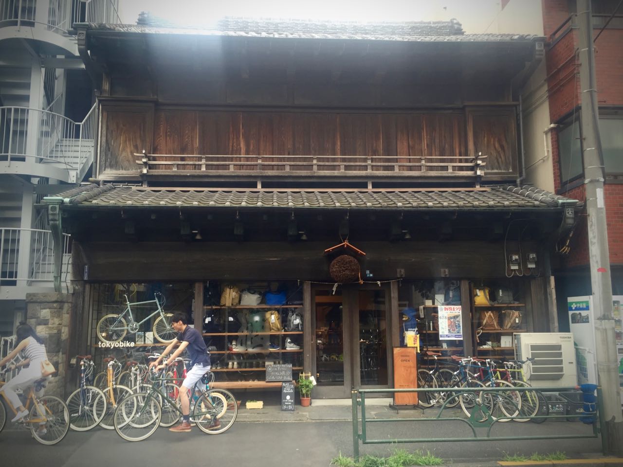 Old wooden structure housing the Tokyobike gallery.